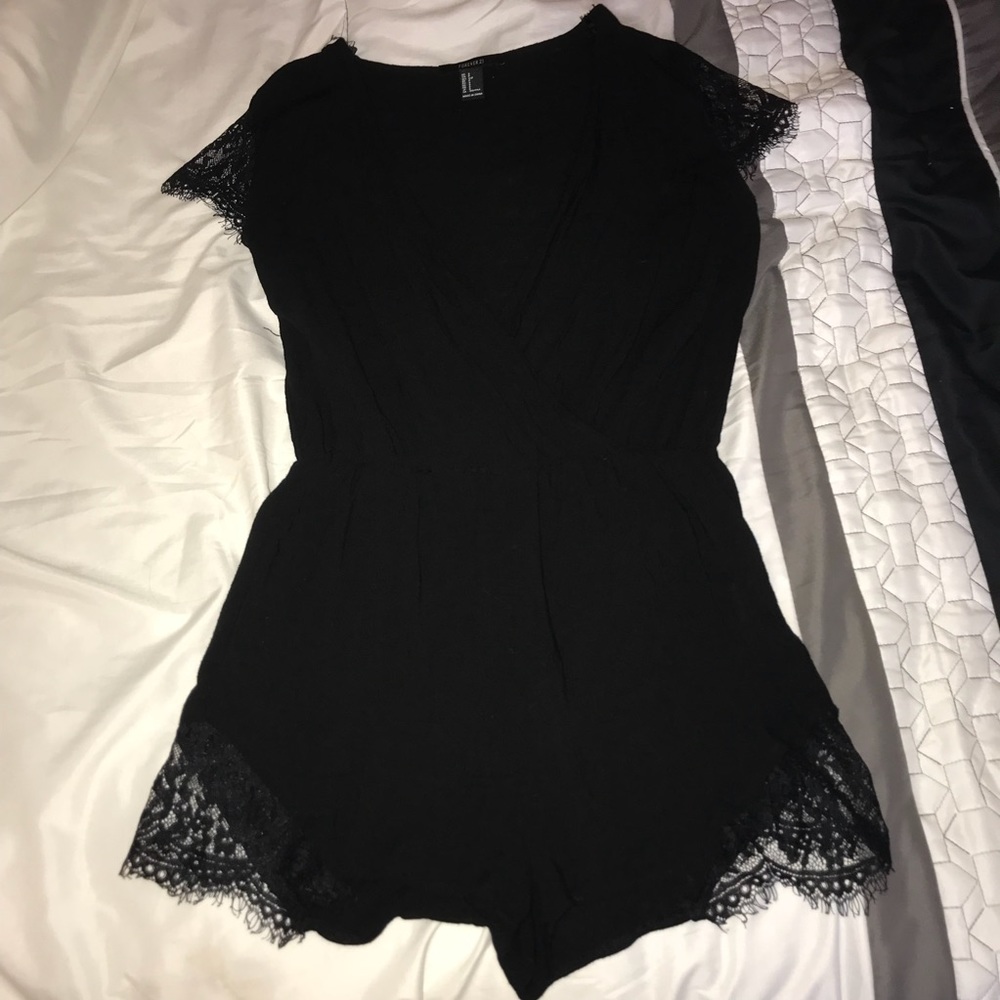Black deep plunge romper